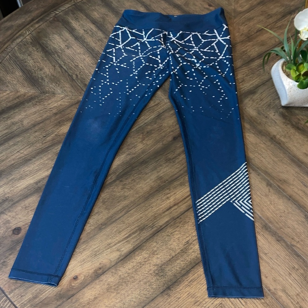 Blue leggings with geometric white print - Medium